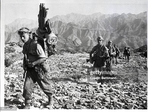 British Paratroopers Traverse Rocky Terrain in Aden