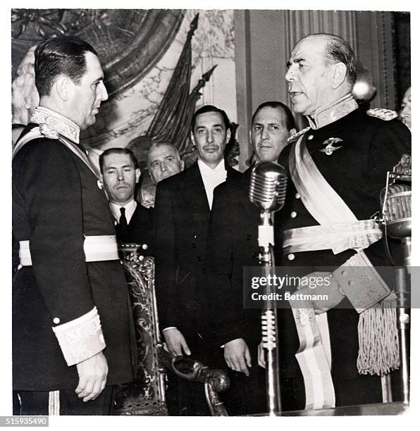 Caracas, Venezuela-Admiral Carlos Larrazabal, who heads the junta which overthrew the dictatorship of Marcos Perez Jimenez, talks to newsmen during...