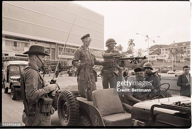 Panama City, Panama-Panamanian National Guard forces move out to restrain opposition demonstrators following the impeachment of President Marco A....