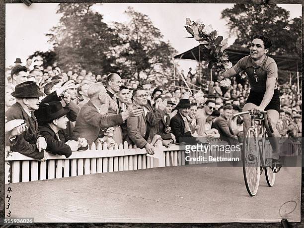 London, England- Photo shows Shello of Italy circling the track after winning the 1000 meters scratch final at Herne Hill this afternoon. Second, was...