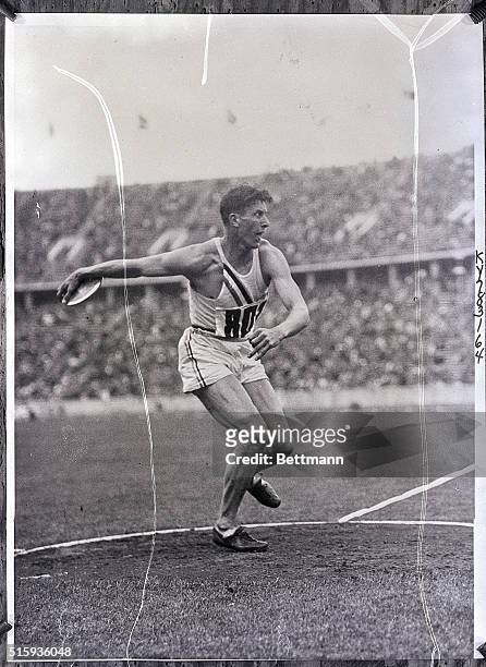 Berlin, Germany- American athlete Glenn Morris, winner of the decathlon, is shown here full-length, throwing the discus.