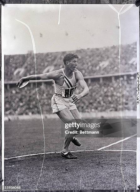 Berlin, Germany- American athlete Glenn Morris, winner of the decathlon, is shown here full-length, throwing the discus.