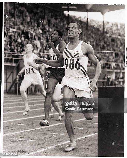 Helsinki, Finland- Mal Whitfield , No. 986, is shown winning the 800 meter final in Olympic Stadium. Whitfield successfully defended his 800 meter...