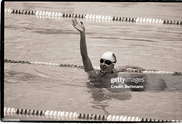 Moscow, Soviet Union- East Germany's Barbara Krause wears a broad smile as she waves to the crowd after cutting almost half a second off her own...