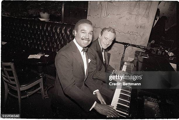 New York, NY- Jack Lemmon shows some finesse on the keyboard along with Bobby Short during a black-tie celebrity cocktail party and concert entitled...