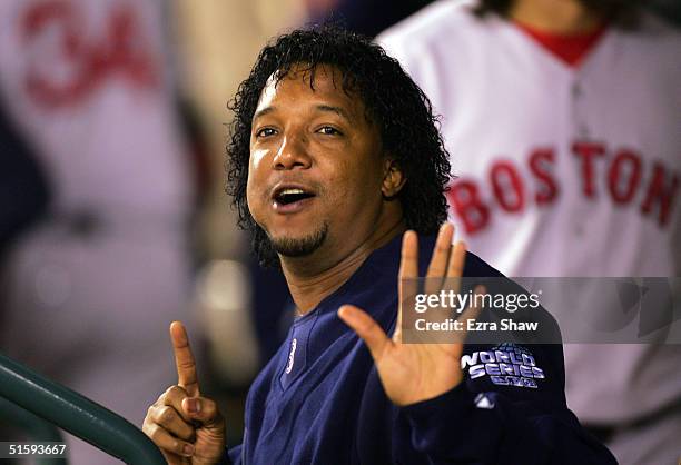 Pedro Martinez of the Boston Red Sox holds up six fingers while in the dugout in the fourth inning agaist the St. Louis Cardinals during game four of...