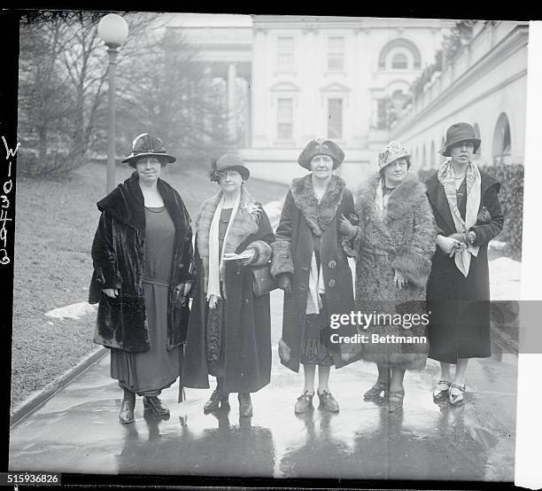 The above photo shows, left to right, Margaret Hinchey of New York, an elevator operator; Mrs. Murray of New York, President of the Women's League of...