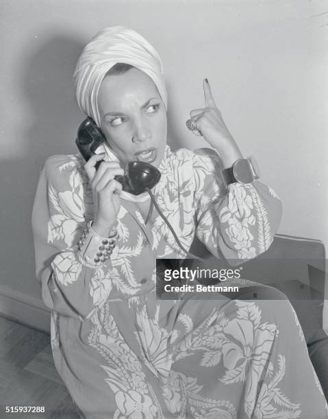 Carmen Miranda Speaking on telephone, 1940s.