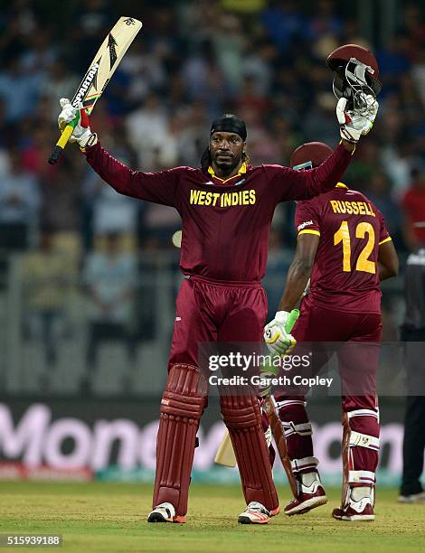 Chris Gayle of the West Indies celebrates reaching his century during the ICC World Twenty20 India 2016 Super 10s Group 1 match between West Indies...