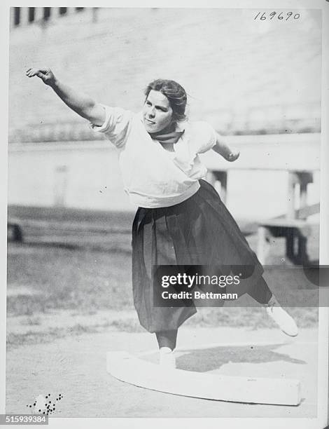 Who Called Them The Weaker Sex - Miss Ida Kern, girl champion shot putter, who is entered in the Y. M. C. A. Meet, to be held in the Harvard Stadium...