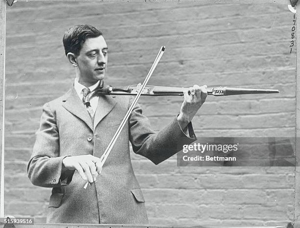 Unique Musical Instrument to Make You Jazz Jazzier. A curiosity originated by Albert Mertes of Cincinnati, in the shape of a walking stick...