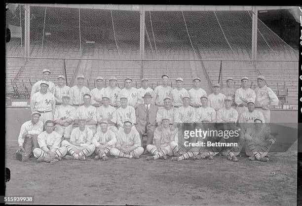 This is the giant Team of 1923 with left to right in the bottom row: Irwin, ; Solomon; Hurtzweger; Gearin; Jonnard; Frisch; Youngs; Groh; McQuillan;...