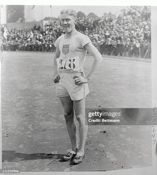 Taylor of the U.S. Olympic team, who set new world's record of 52 3-5 seconds in winning the 400 meter hurdle race.