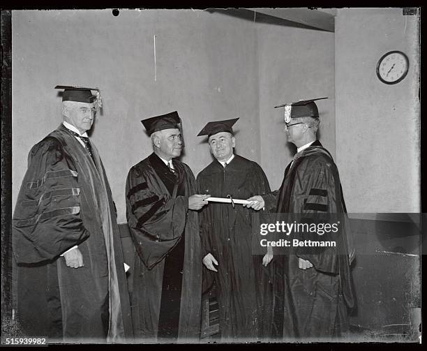 Govenor Herbert H. Leman of New York is seen here as he received a Doctor of Law degree from Dr. Thornwell Jacobs, President of Oglethorpe...