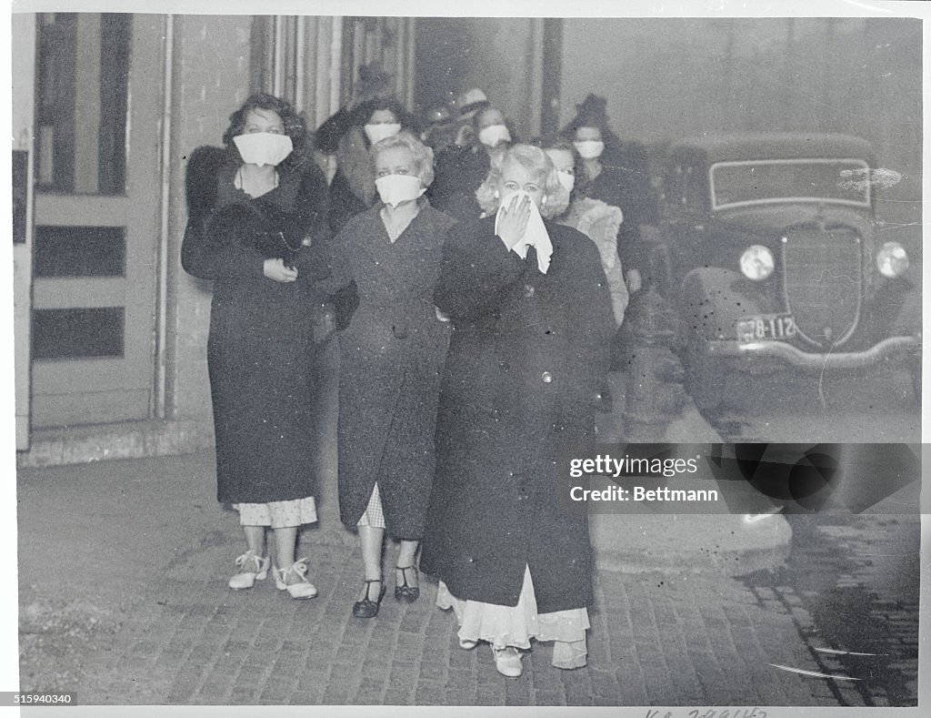 Women Wearing Masks During Dust Storm