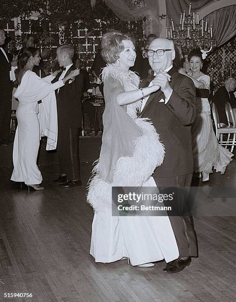 Impressario sol Hurok dances with famed prima ballerina Alexandra Danilova at a party he hosted celebrating the closing performance of the Bolshoi...