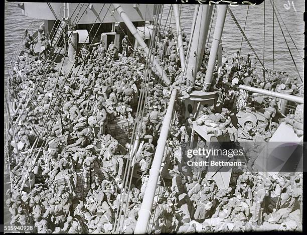 Somewhere on the Atlantic: Move over "Bub" must be the favorite phrase of these Negro troops enroute to the British Isles. The boys seem to us to be...