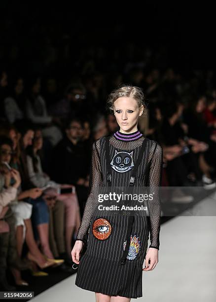 Model presents a creation by Deniz Berdan during the 2016/2017 Fall/Winter Mercedes-Benz Fashion Week at Zorlu Center MBFWI in Istanbul, Turkey, on...