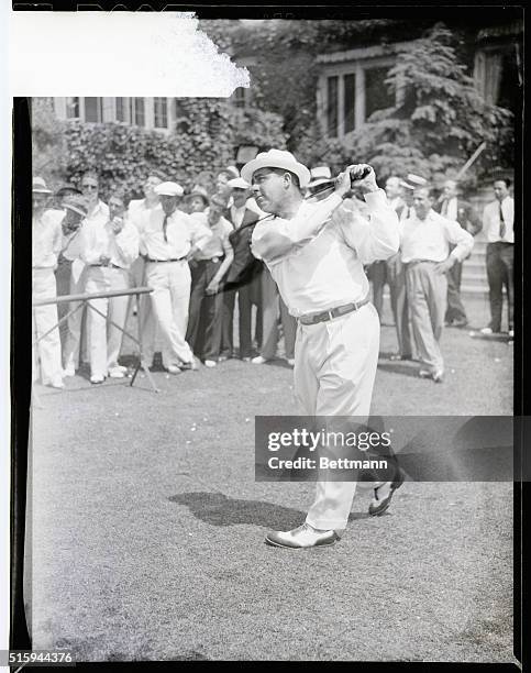 Golfer Walter Hagen tees off from the first hole during a practice round at Balustrol Golf Club in preparation for the National Open. June 3, 1936. |...