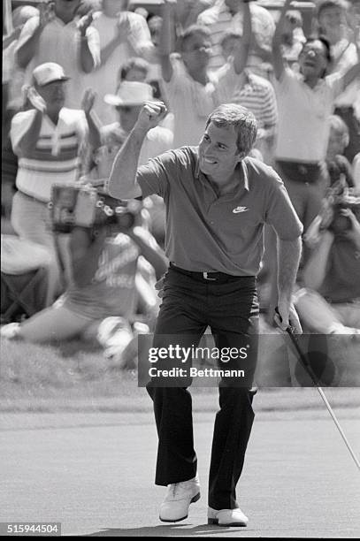 Golfer Curtis Strange waves his fist in the air in celebration after winning the Independent Insurance Agents Open in The Woodlands, Texas. May 1,...