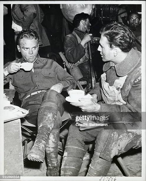 Actors James Cagney and Jeffrey Lynn take a tea break during the filming of The Fighting 69th, on January 12 at 3 a.m.