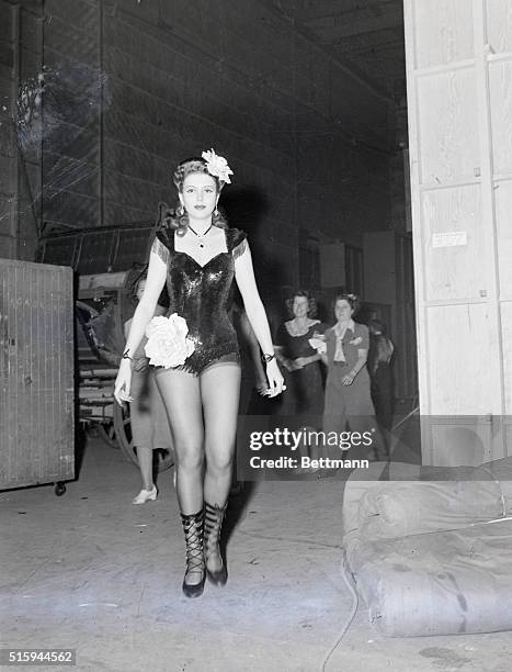 Gay Nineties Chorus Girl---is Ann Miller in her newest Columbia Picture, "Go West, Young Lady" which is now in production. Miss Miller, one of the...