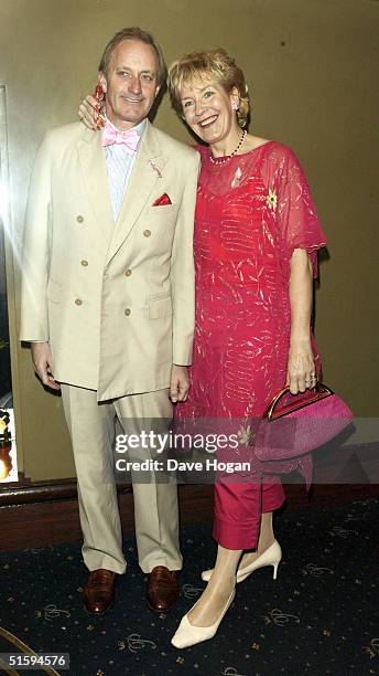 Former Tory MP Neil Hamilton and his wife, talk show host Christine Hamilton attend the 25th anniversary and book launch party for cult adult comic...