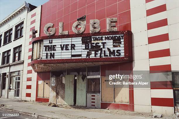The derelict Globe cinema in the Grand River area of Detroit, Michigan, USA, 24th April 1986.