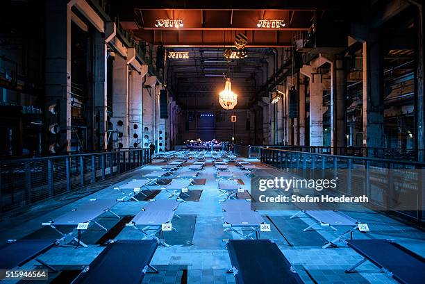 Camp beds await concertgoers for the public world premiere of Max Richter's 8 hour long 'SLEEP' live performance during 'Maerzmuisk' Festival at...