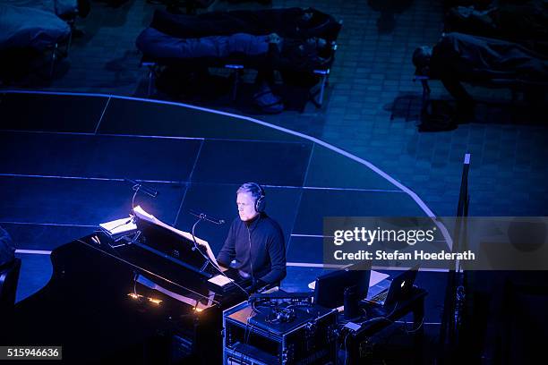 Composer Max Richter performs on stage in front of a sleeping audience during the public world premiere of his 8 hour long 'SLEEP' live performance...