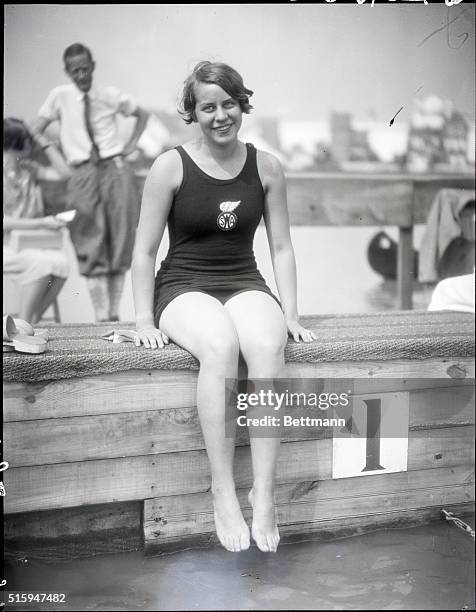 Philadelphia, PA: Martha Norelius, New York's Swimming Association. Sitting on edge of pool at National Swim.