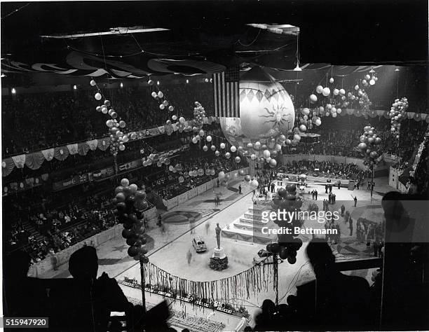 New York: This general view of the "intimate" party given by producer Mike Todd in Madison Square Garden here, October 17th, shows the 20-foot floral...