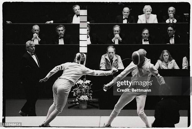 Italy's Marco Marin and France's Jean Francois Lamour fence in a match during the 1984 Olympic Games in Los Angeles.