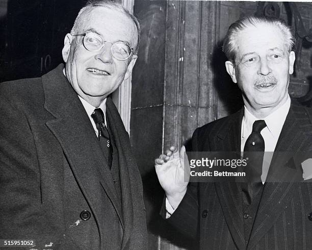 London, England: U.S. Secretary of State John Foster Dulles poses with British Prime Minister Harold MacMillan outside No. 10 Downing Street here...