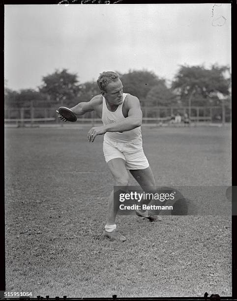 Olympic Meet at Harvard Stadium: John F. Anderson, N.Y.A.C. Discus. Shown here throwing the discus.