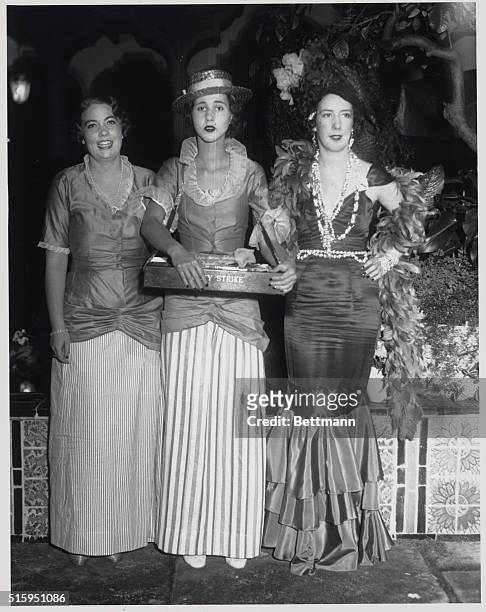Palm Beach, FL: Left to right Miss Marguerite Brokaw of New York, Miss Mary Munn of PA, and Miss Ellisa Plankington as they appeared as cigarette...