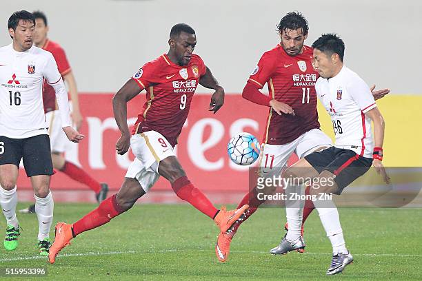 Jackson Martinez and Ricardo Goulart of Guangzhou Evergrande in action during the AFC CHampions League match between Guangzhou Evergrande and Urawa...
