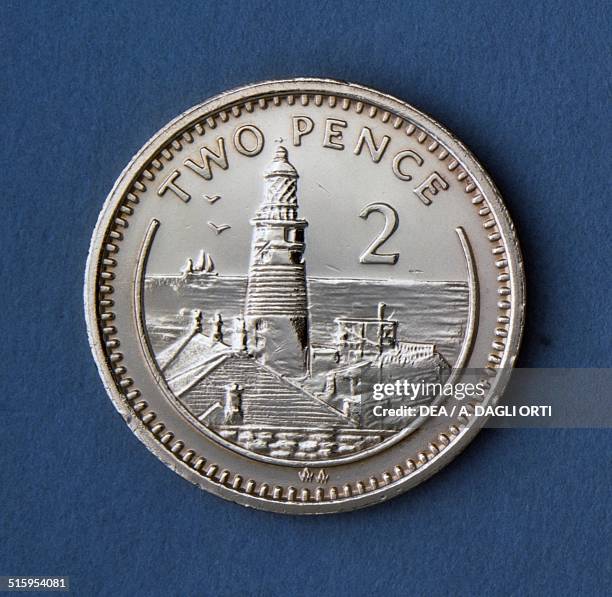 Pence coin reverse, lighthouse. Gibraltar, 20th century.