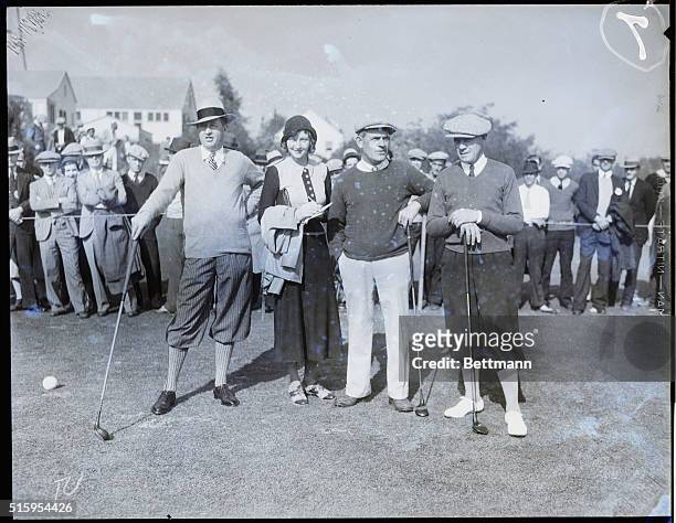Los Angeles, Ca: Veteran Scottish golfer MacDonald Smith is shown posing with Jean Fernwick, John Black, and Lew Scott, after winning the Los Angeles...