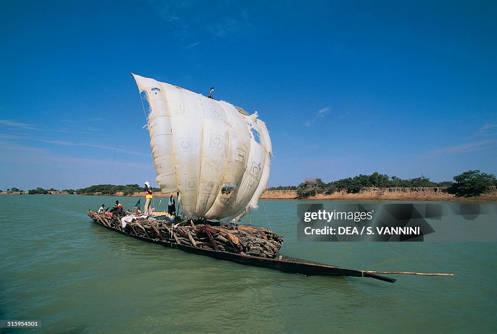 Pirogue sailing on one of canals