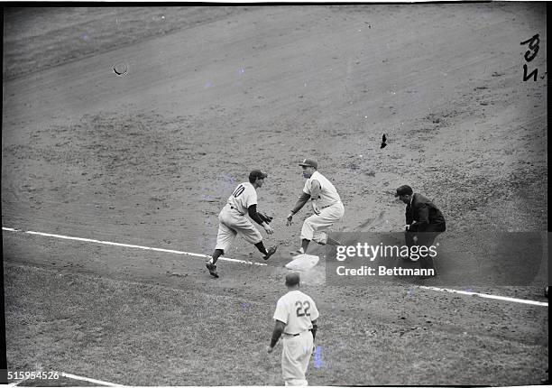 New York, NY: This bit of baseball ballet or "may I have this dance" came in the Dodgers' fourth when Duke Snider, Dodger Center fielder steamed into...