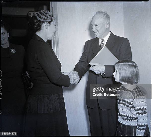 New York, NY: President-elect Dwight Eisenhower thanks Mrs. Elizabeth Van Dine Smith, Chairwoman of the Passaic County, N.J., Women's Club, after...