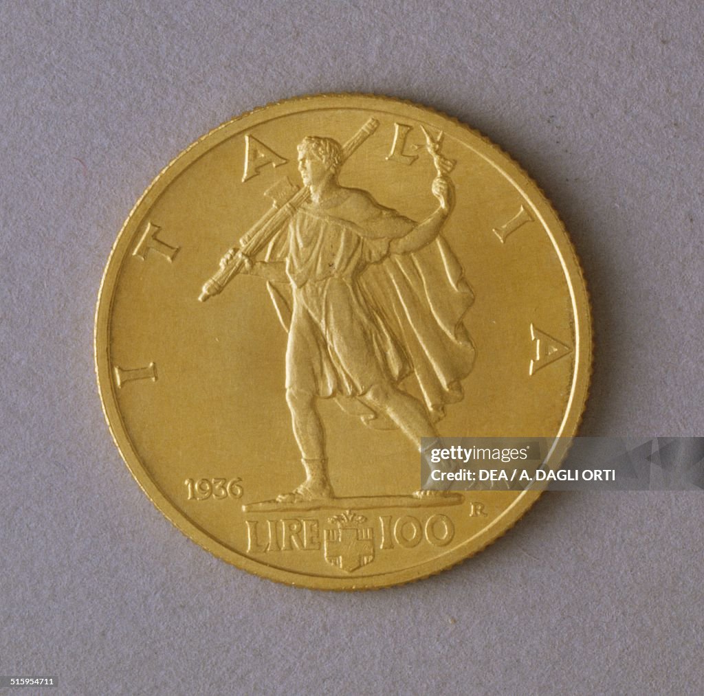 100 lire gold coin...