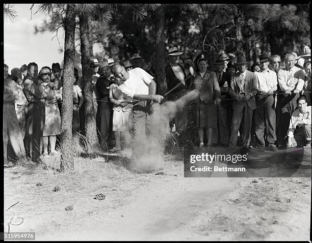 Spokane, Washington- Bob Hamilton, Evansville, Indiana, in the woods on the 34th hole, made a bogey, lost to McSpaden's par, but won the match by...