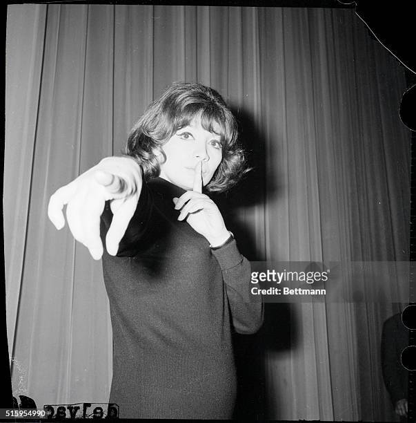 Paris, France- It's a Greco pointing, not a Greco painting. French singer Juliette Greco, garbed in black rehearsal clothes, seems to be telling...
