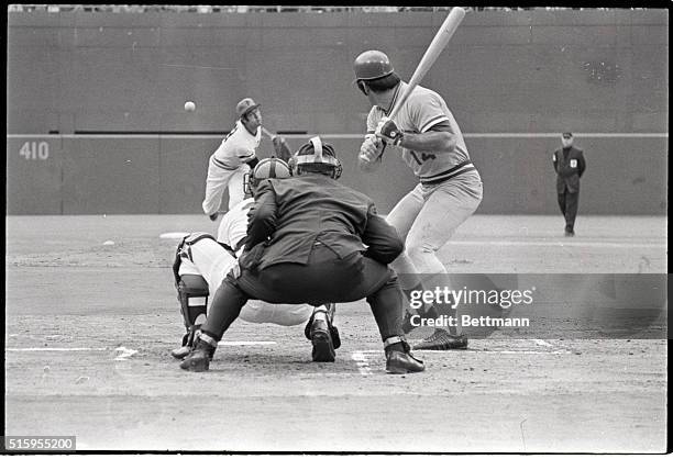 Pittsburgh, Pennsylvania-Pirates Steve Blass fires first pitch of National League play-off, 10/7, to Reds' Pete Rose. Rose flied out. Catcher is...