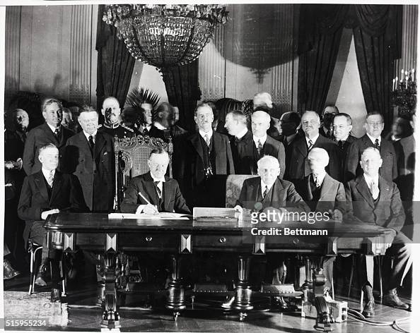 President Coolidge Signs Kellogg-Briand Pact