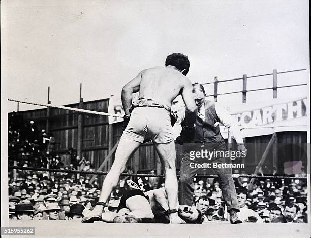 After Owen Moran, British lightweight, had knocked out Battling Nelson, he was matched with Al Wolgast, lightweight champion. The photo shows Moran...