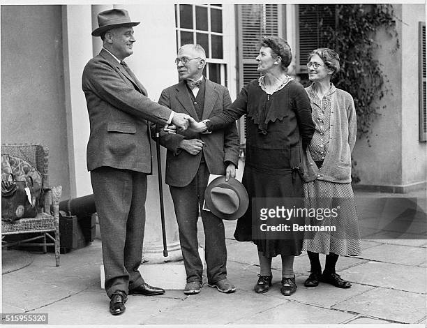 President Franklin Delano Roosevelt bids farewell to Hyde Park family retainers as he leaves for the White House. From left to right: Roosevelt,...