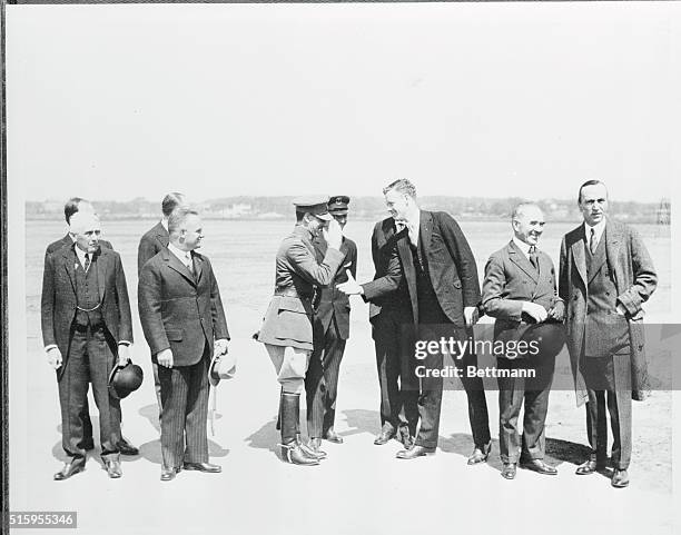 The group left to right: Secretary of State Kellogg; Captain Hermann Koehl; Major James Fitzmaurice; Colonel Charles Lindbergh; Timothy Smiddy,...